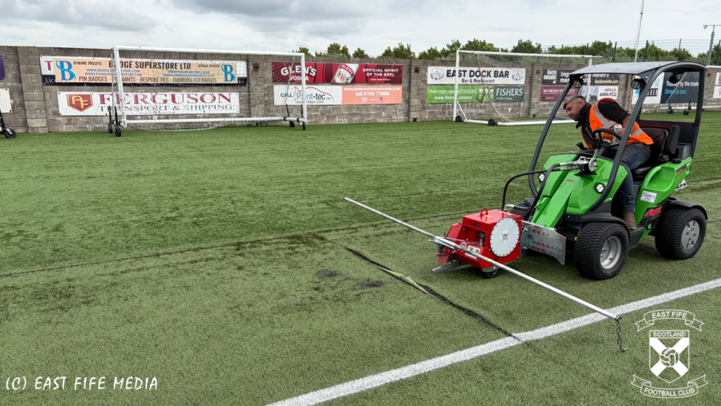 Tractor on pitch at Bayview Stadium