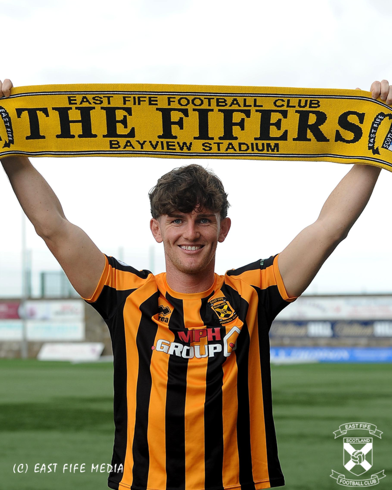Reis Peggie with East Fife scarf above his head
